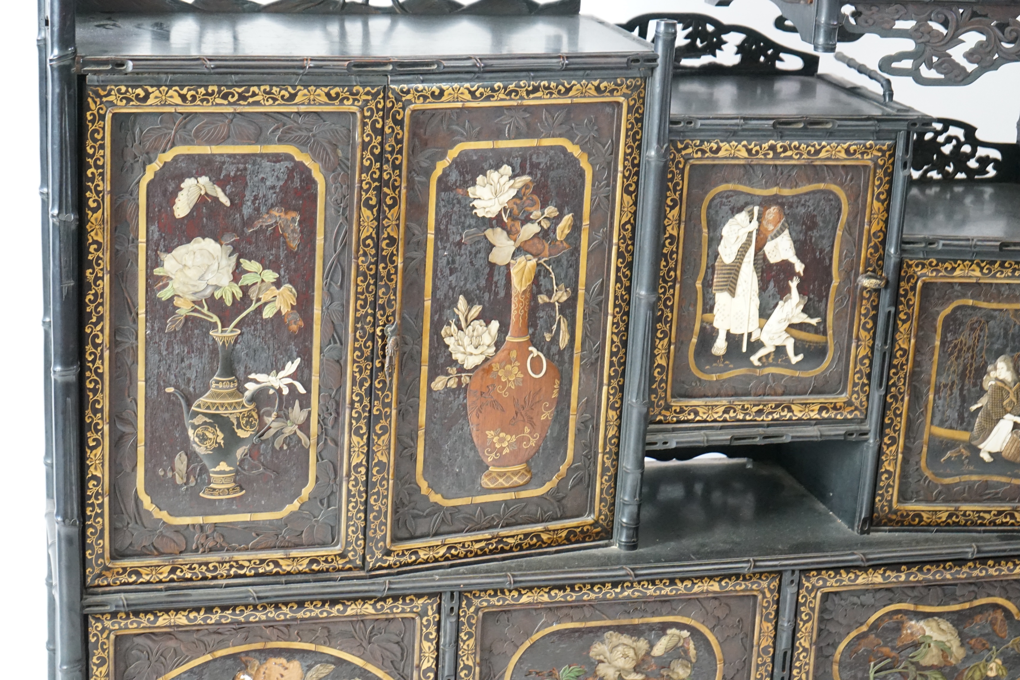 A Japanese Shibayama style inlaid wood cabinet, Meiji period